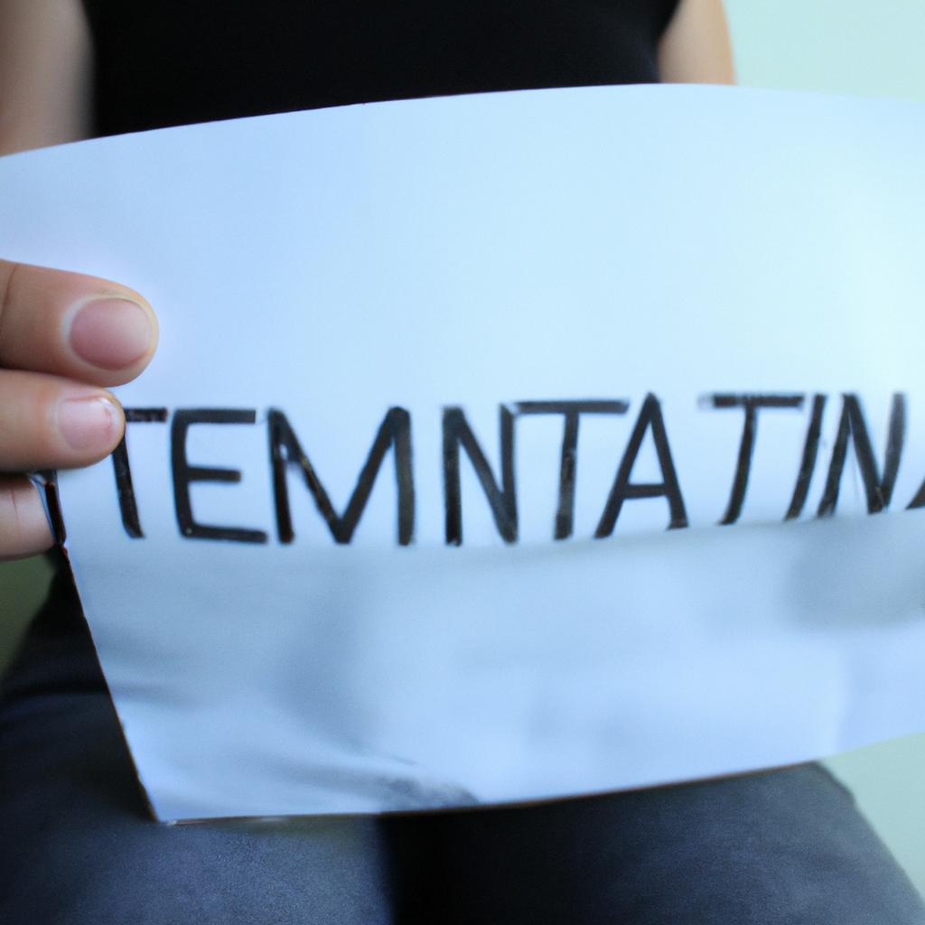 Person holding a termination letter