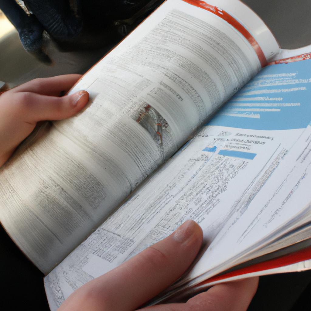 Person reading train service brochure